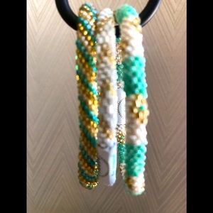 Aid Through Trade roll on bracelets